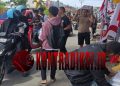 Haji Suci Bagikan 100 Paket Makanan Siap Saji di Simpang Marisa, Wujud Kepedulian Sosial di Hari Jumat